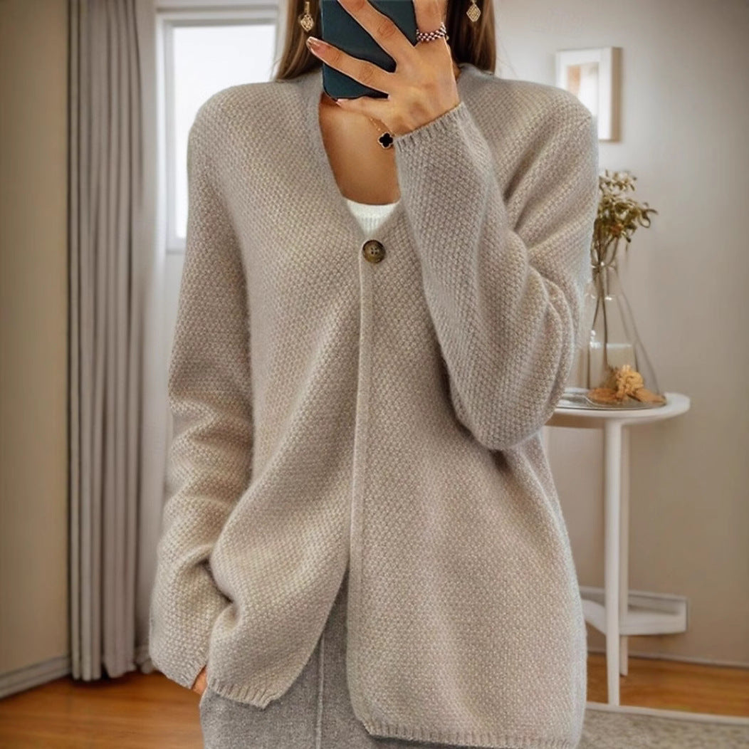 Women's knitted jacket with a fine textured pattern and a button detail Lune London