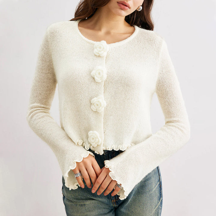 Ladies short knitted jacket with decorative floral button Lune London