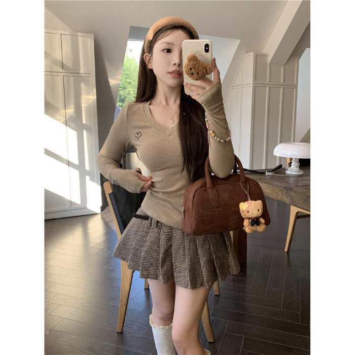 Women's long-sleeve shirt with V-neck and elegant rib structures Chic & Stil