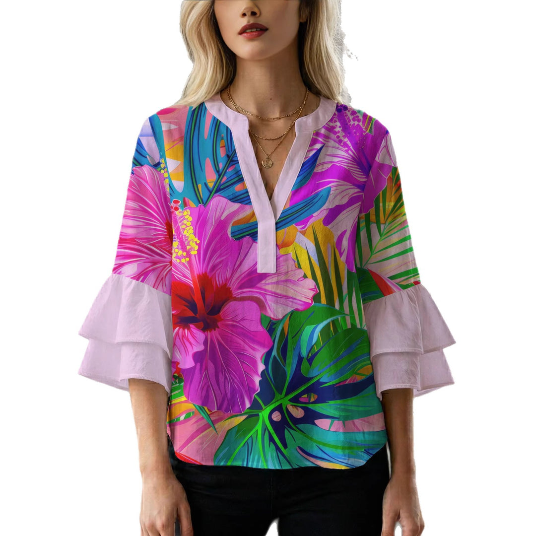 Women’s blouse with voluminous ruffled sleeves and floral pattern Lune London