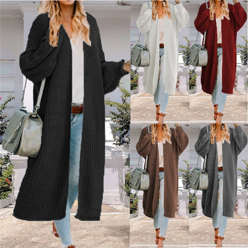 Women’s knit coat with open design and voluminous sleeves Lune London