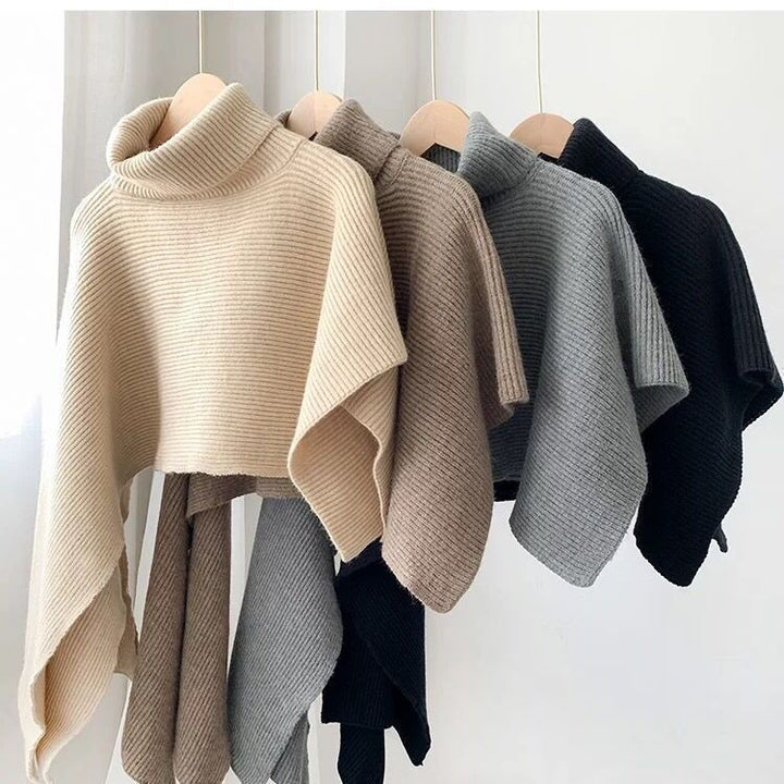 Ladies knitted poncho with high collar and elegant ribbed texture Lune London