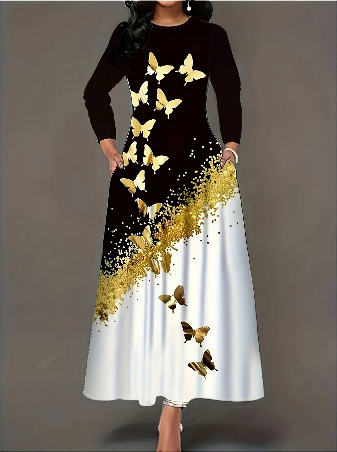 Maxi dress for ladies with an elegant butterfly design and gold accents Lune London