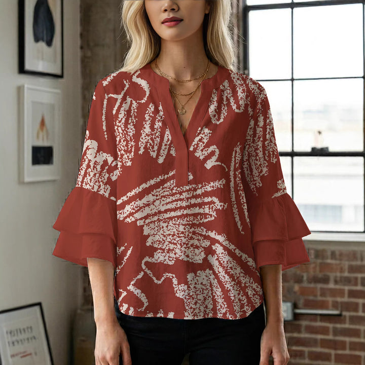 Ladies elegant blouse shirt with voluminous puff sleeves and graphic floral design Lune London