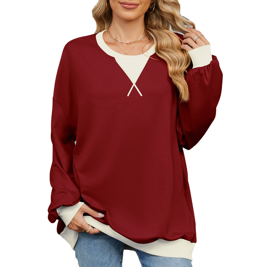 Casual oversized sweatshirt for women with a modern V-neck and chic elegant cuffs