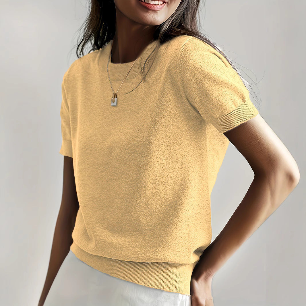 Fine knit sweater for women with a short sleeve silhouette and a soft fluid material Elegance and style