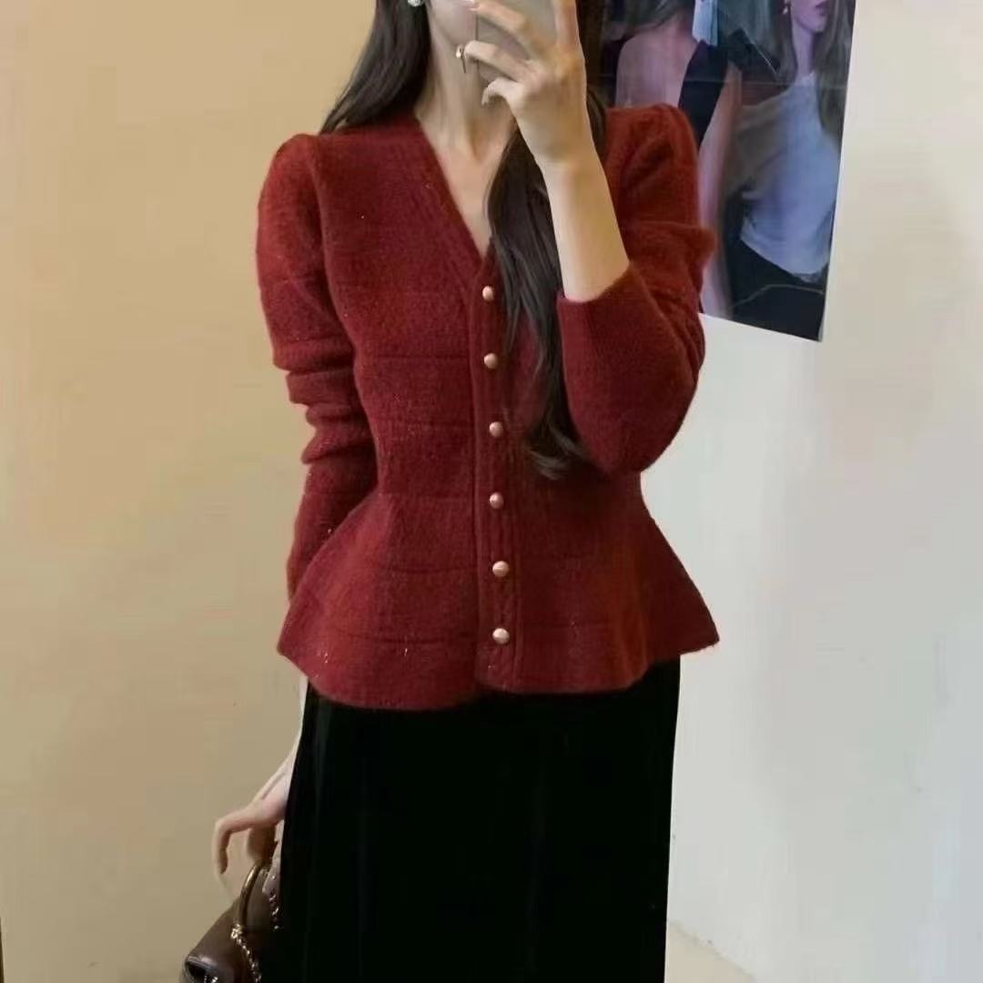Ladies elegant cardigan with textured design and feminine puff sleeves Lune London