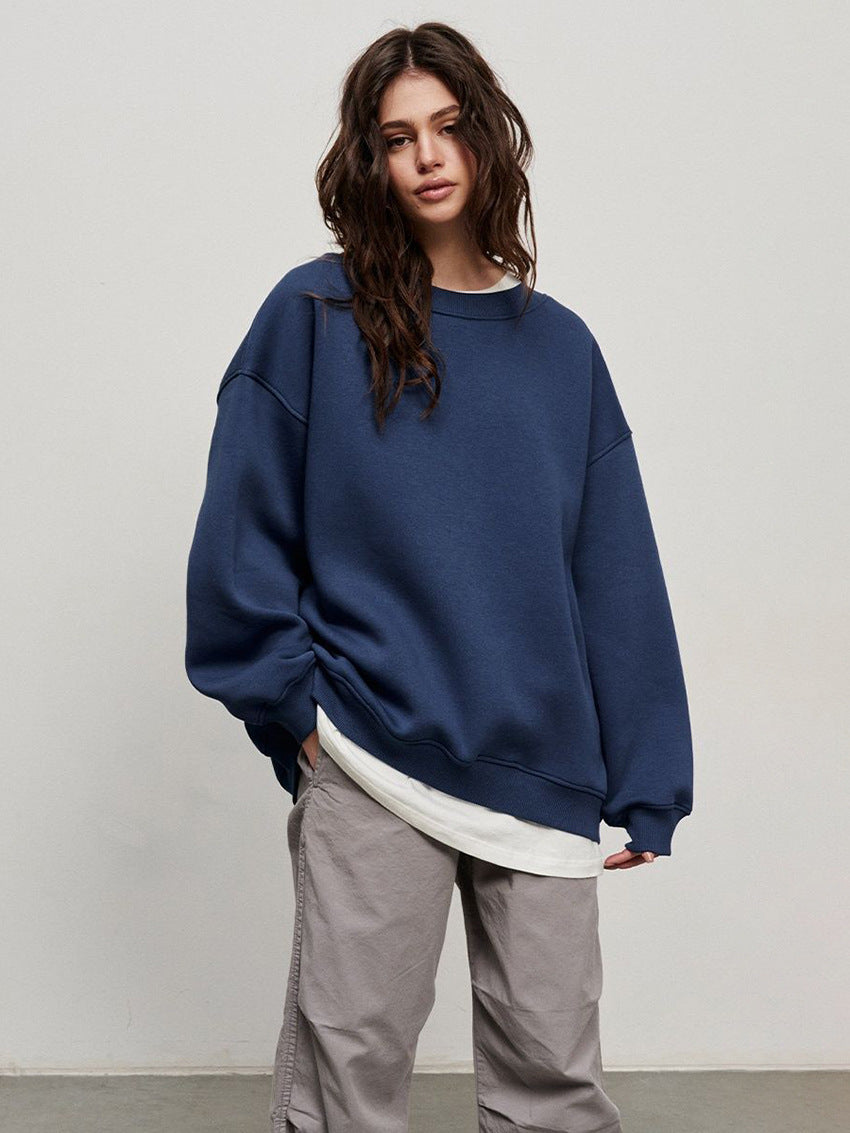 Woman Oversized sweatshirt with a relaxed fit and modern chic accents and style