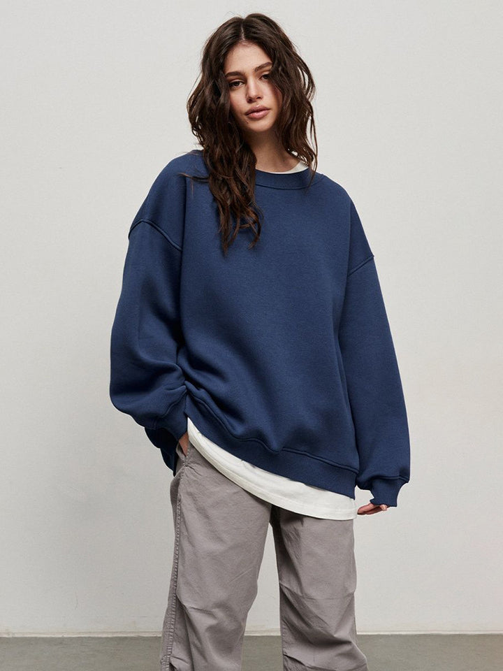 Woman Oversized sweatshirt with a relaxed fit and modern chic accents and style