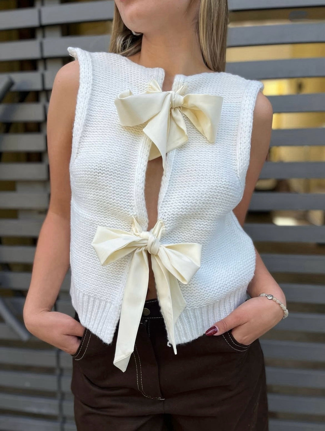 Sleeveless knit vest for women with decorative bows at the back Lune London