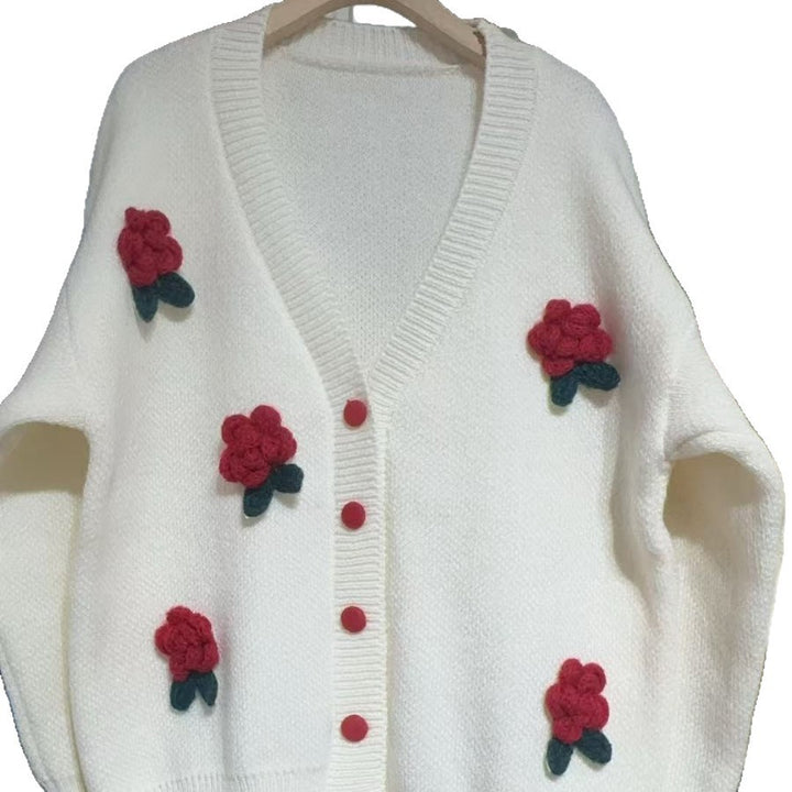 Femmes cardigan ludique en tricot avec des appliques florales et des détails de boutons Lune London