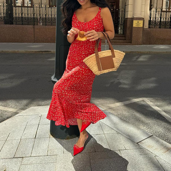 Fitted floral dress for women with spaghetti straps and a flared hem Lune London