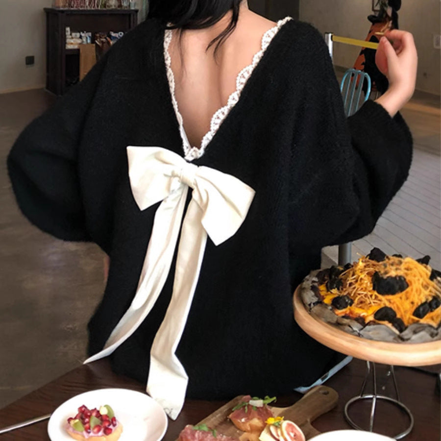Oversized knit sweater for women with V-neck and delicate lace trim Lune London