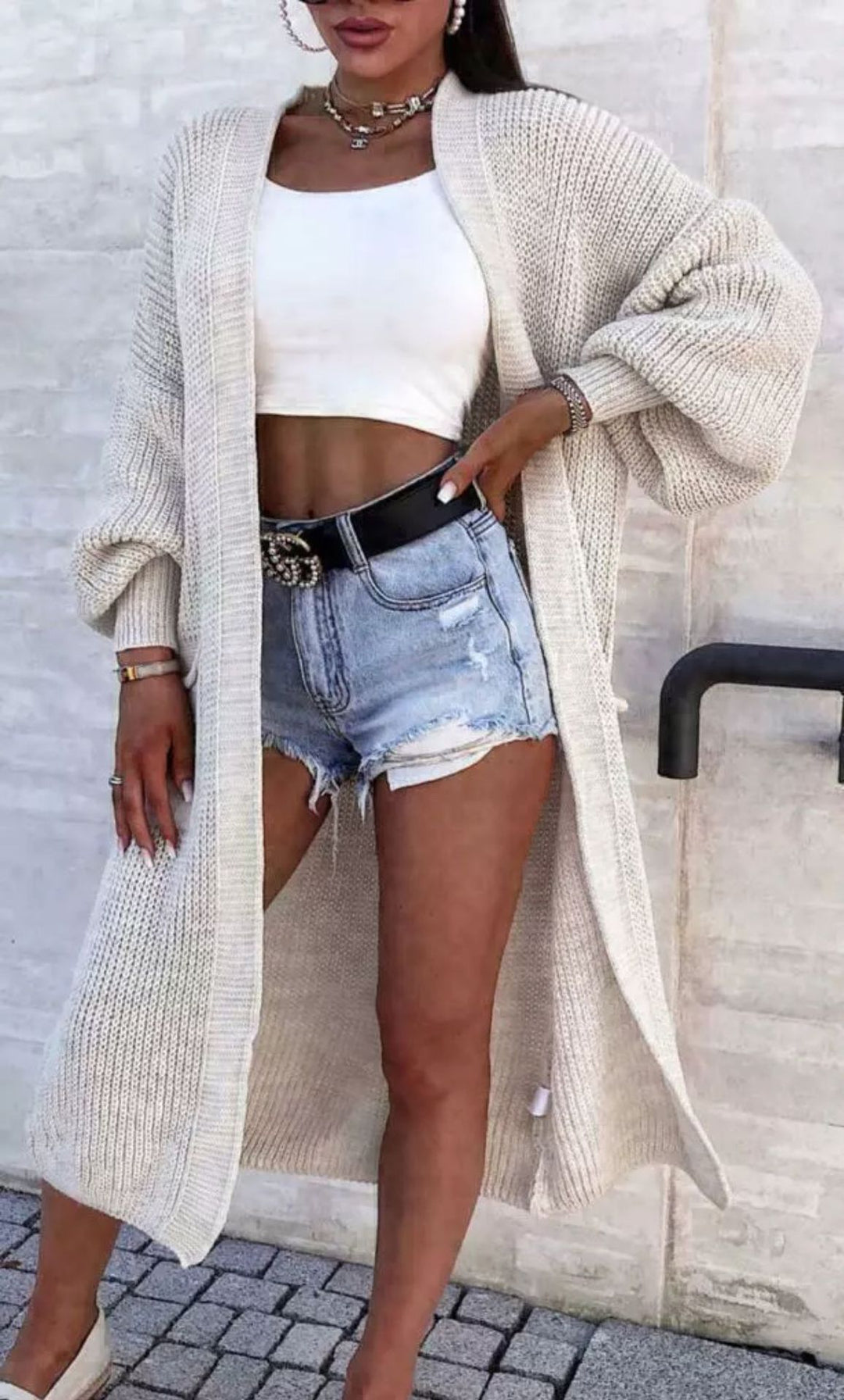 Women Large knit cardigan with deep pockets and generous sleeves Lune London