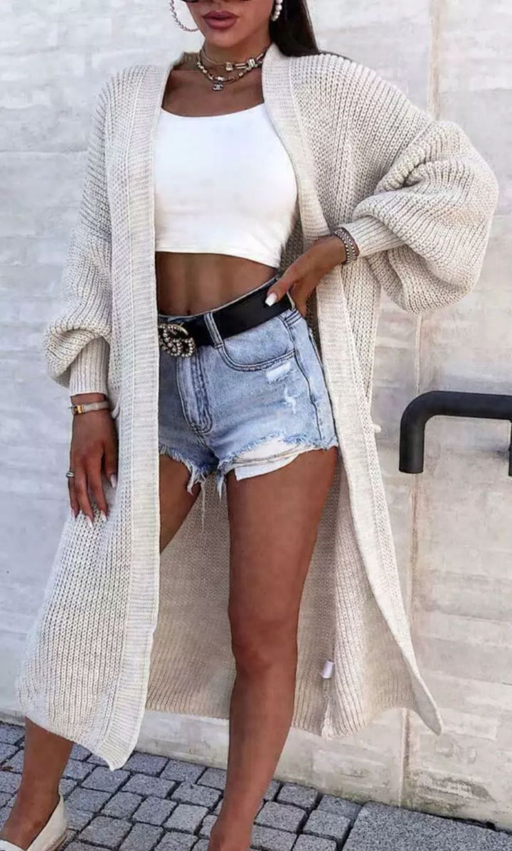 Women Large knit cardigan with deep pockets and generous sleeves Lune London