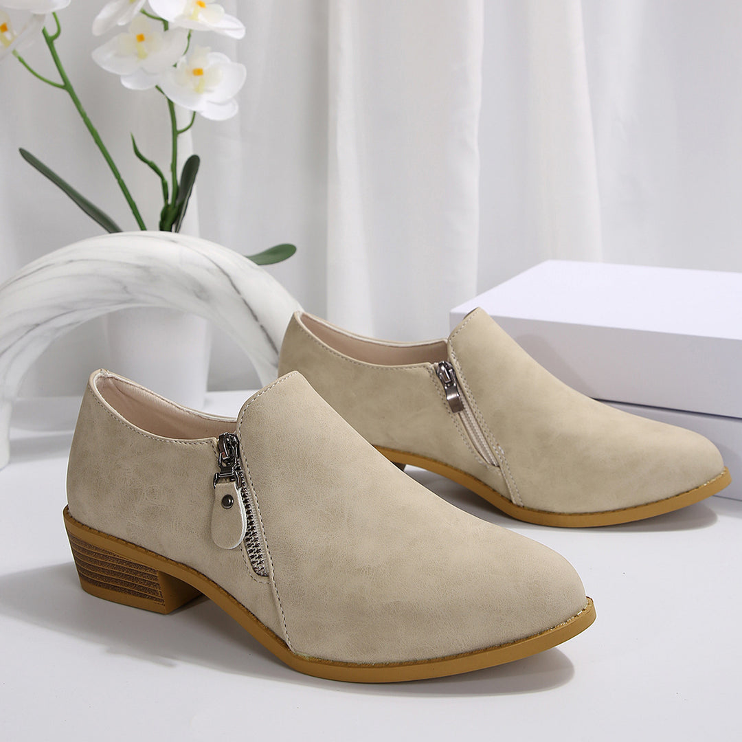 Trendy ankle boots for women with a chic zipper design Lune London