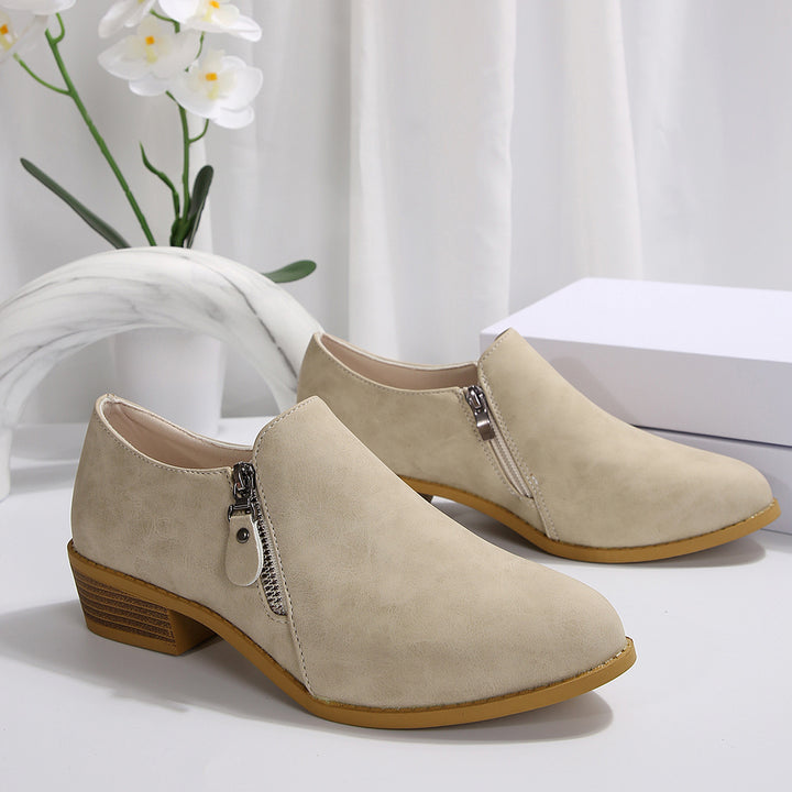 Trendy ankle boots for women with a chic zipper design Lune London