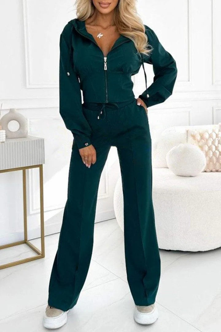 Women's sports jumpsuit set with high collar and practical pockets Lune London