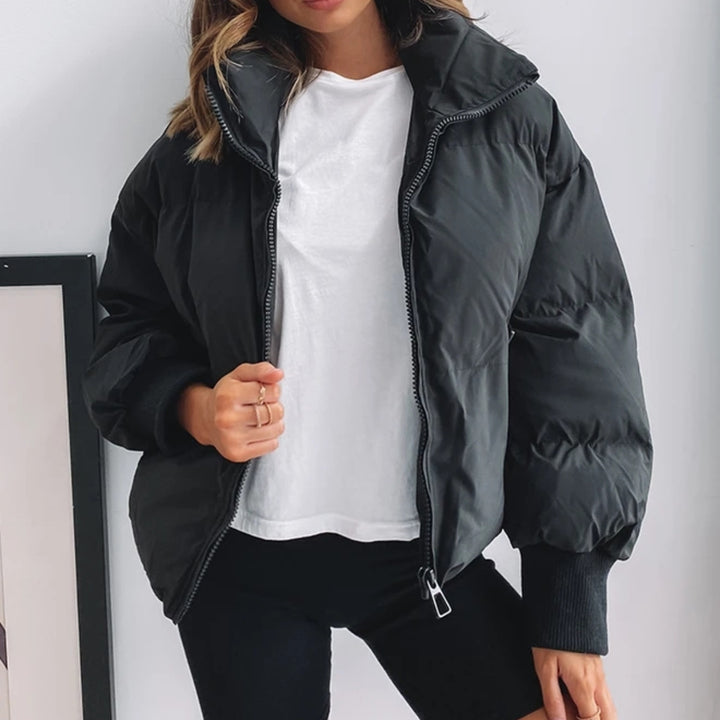 Women's casual quilted jacket with hood and elastic cuffs Chic & Stil