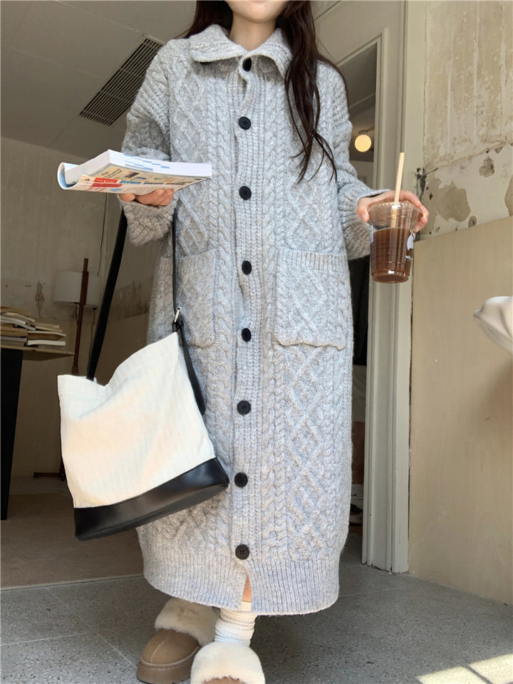 Thick knit button coat for ladies with an elegant cable pattern and practical pockets Lune London