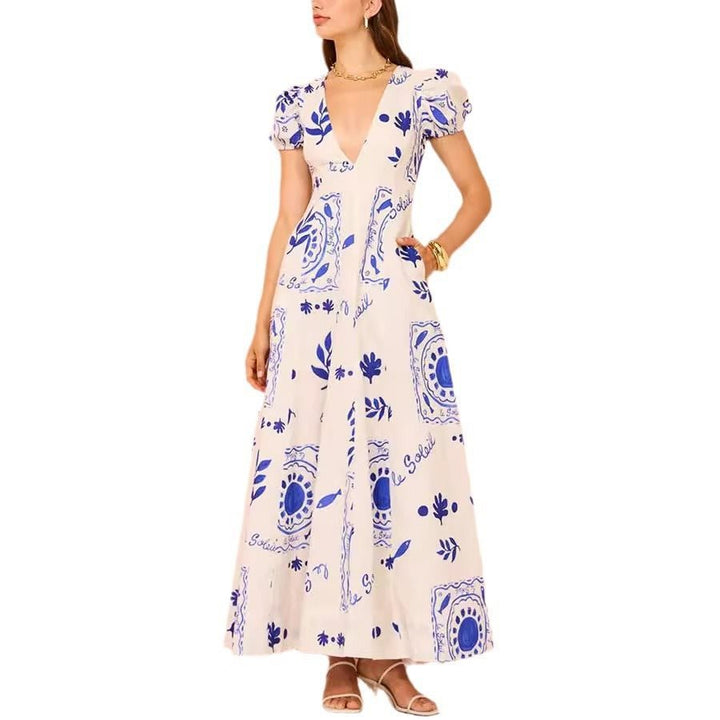 Maxi dress for women with voluminous puff sleeves and floral patterns Lune London