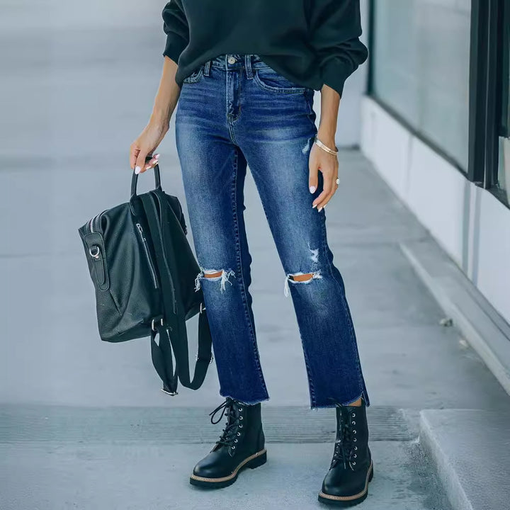 Modern high-waisted jeans for women with a chic and stylish worn look