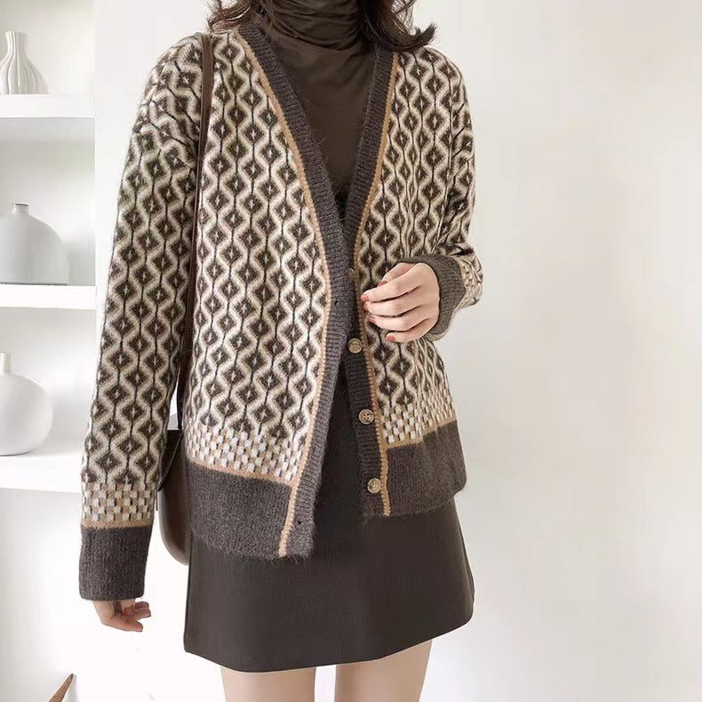 Femme cardigan élégant avec motif géométrique et détails de boutons Chic & Stil