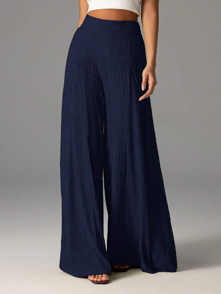 Wide pleated pants for women with high waist and elastic waistband Lune London
