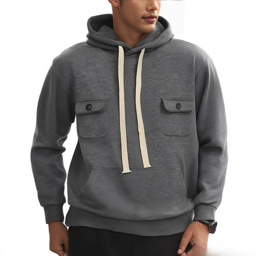 Men's hoodie with practical pockets and textured design Chic and style