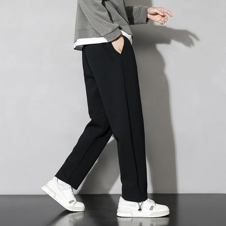 Casual jogger pants for men with elastic waistband and zippered pockets on the sides Lune London