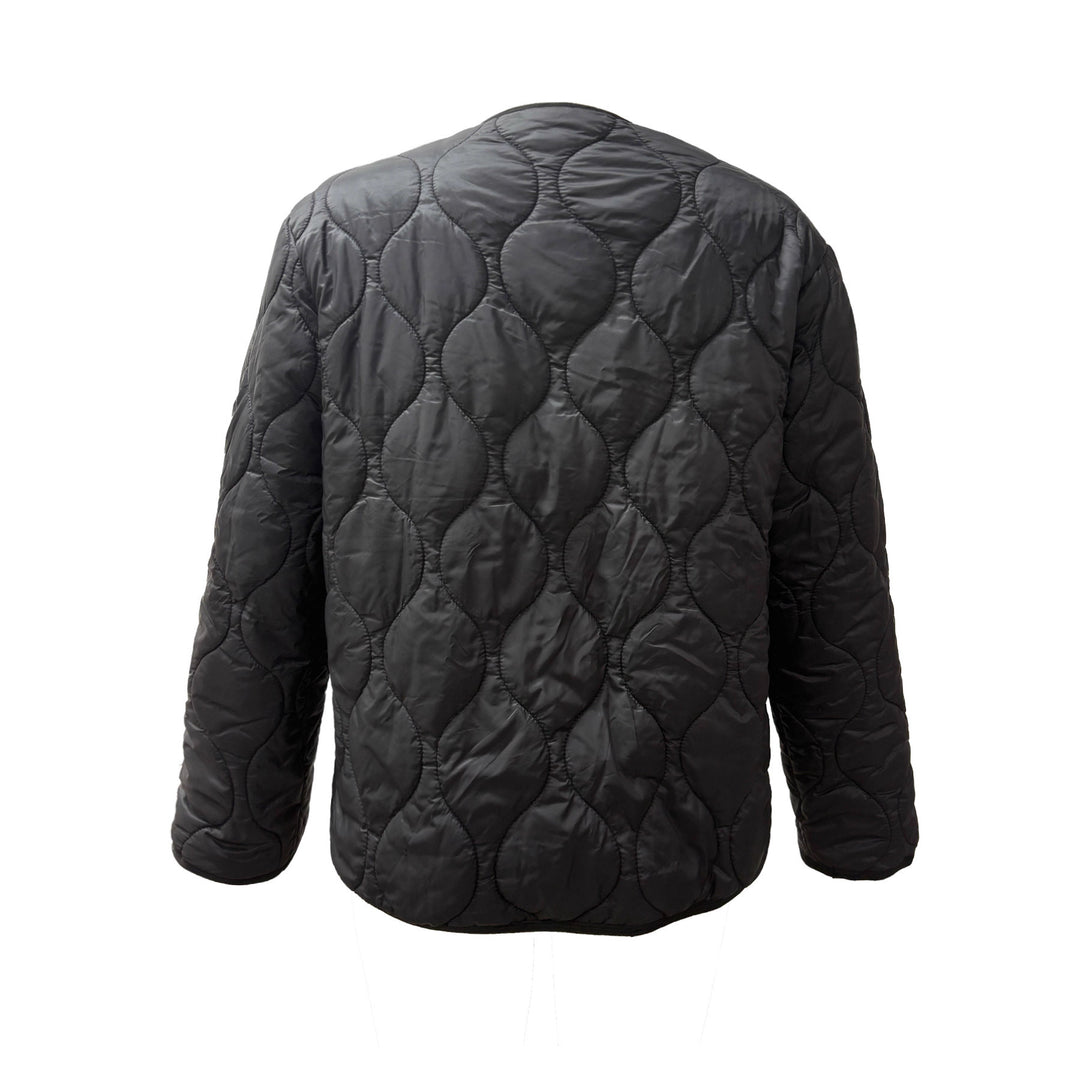 Veste matelassée pour femmes au design moderne et aux poches pratiques Chic & Stil