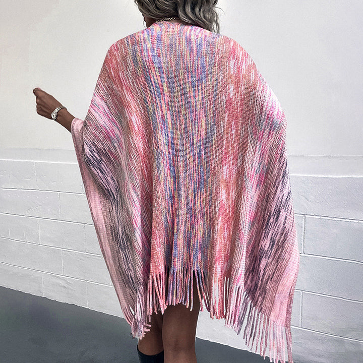Ladies fashionable poncho with luxurious faux fur trim and creative fringes Lune London