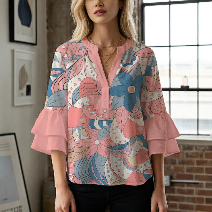 Ladies elegant top with voluminous ruffle hems and floral design Lune London