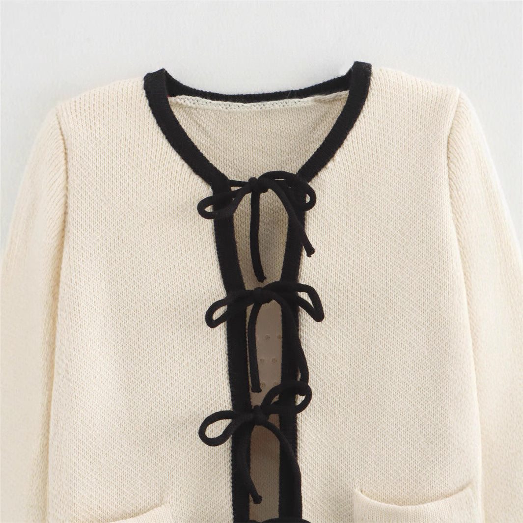 Ladies Elegant cardigan with refined knots and chic pockets Style and Chic