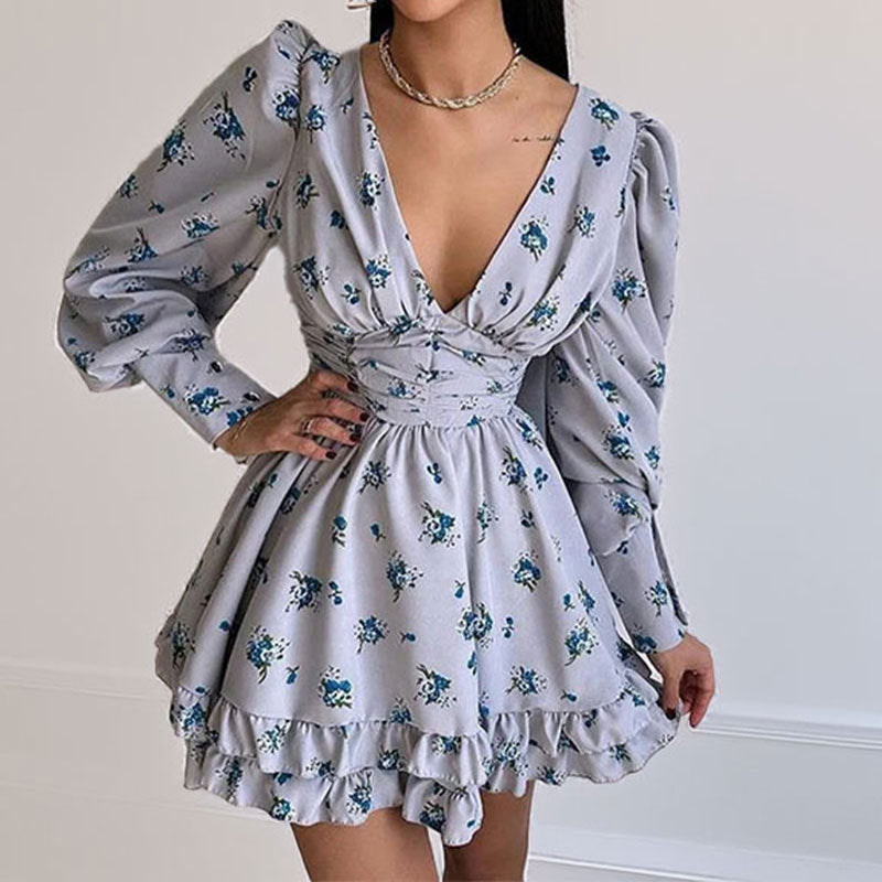 Robe à fleurs ludique pour femmes avec des manches volumineuses et une jupe froncée Chic & Stil