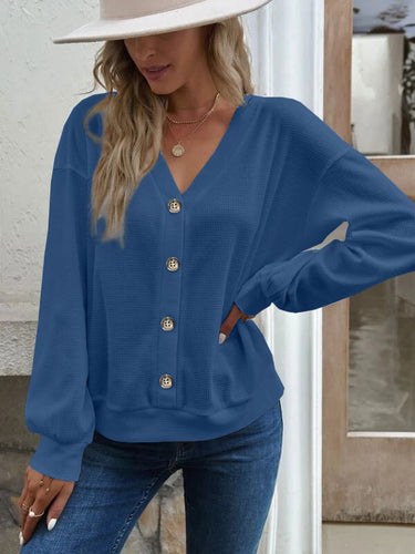 Ladies casual knitted jacket with chic button placket and style