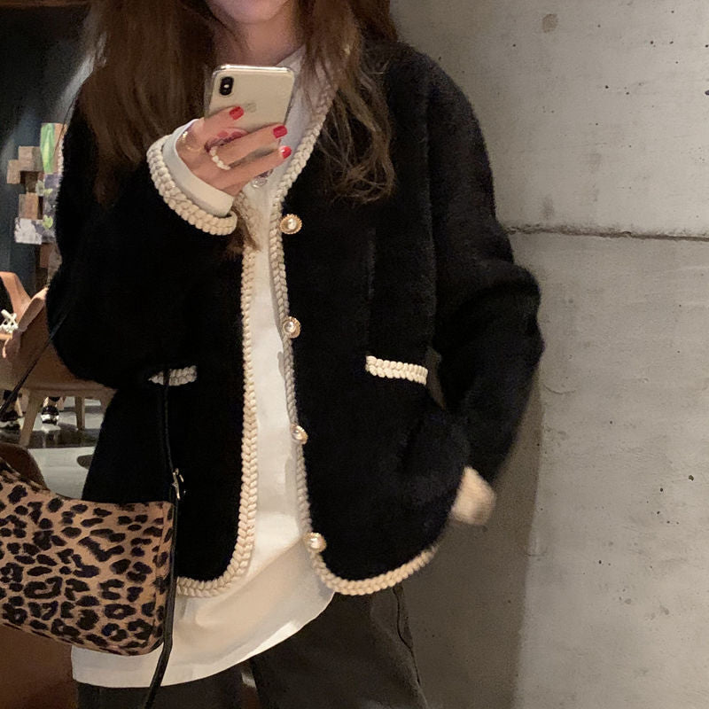 Ladies elegant cardigan with decorative pearl accents Lune London