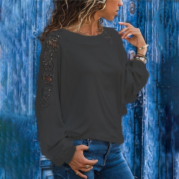 Top femme avec des manches en dentelle décoratives Chic & Stil