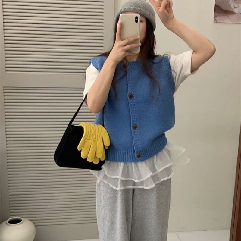 Gilet tricoté pour femme avec fermeture à boutons et coupe tendance Chic & Stil
