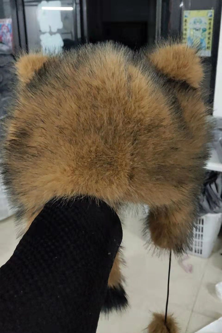 Ladies fashionable fur cap with ear protection and pom-poms Lune London