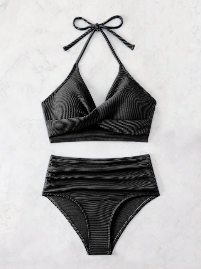 High-waisted women's bikini with an elegant draped top and a playful design Lune London