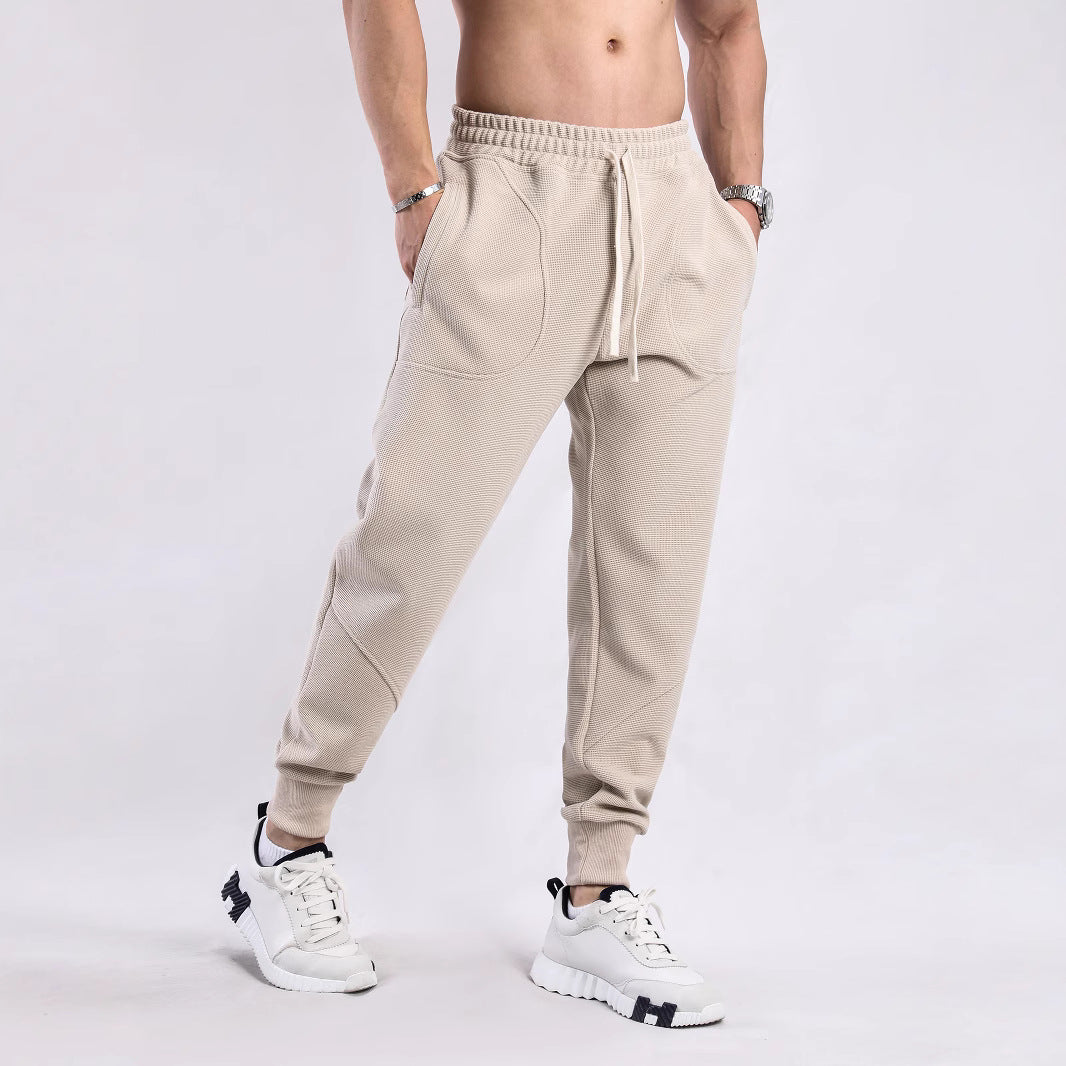 Men's sporty jogger pants with breathable inserts and elastic waistband Lune London