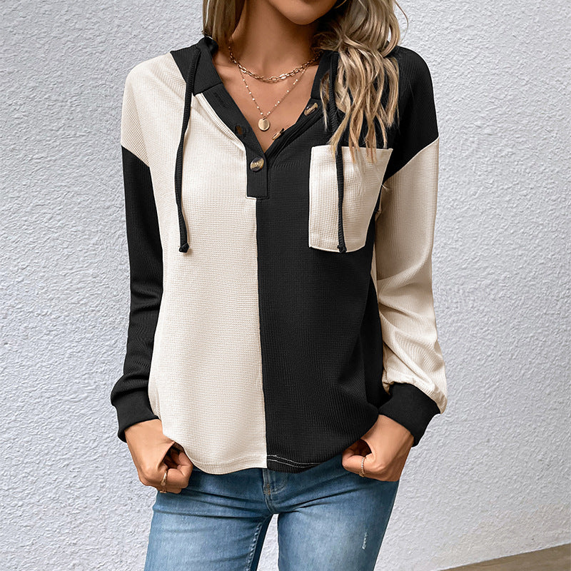 Casual women's top with hood and button placket Lune London