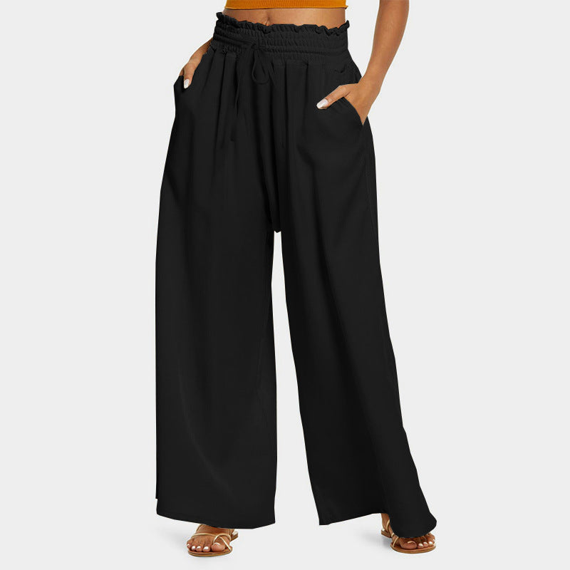 Wide palazzo pants for women with elastic waistband and practical pockets Lune London