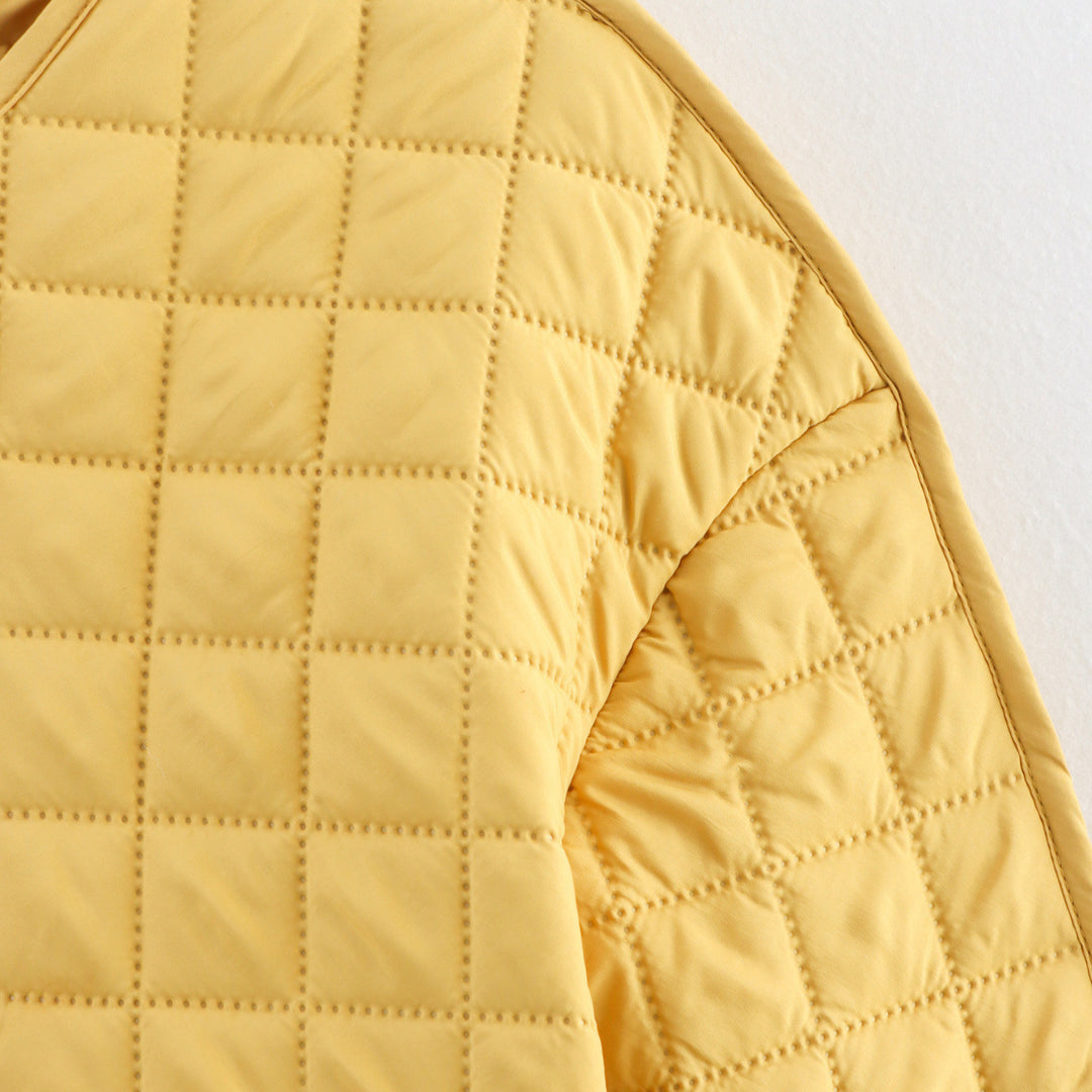 Quilted transition jacket for women with practical pockets Lune London