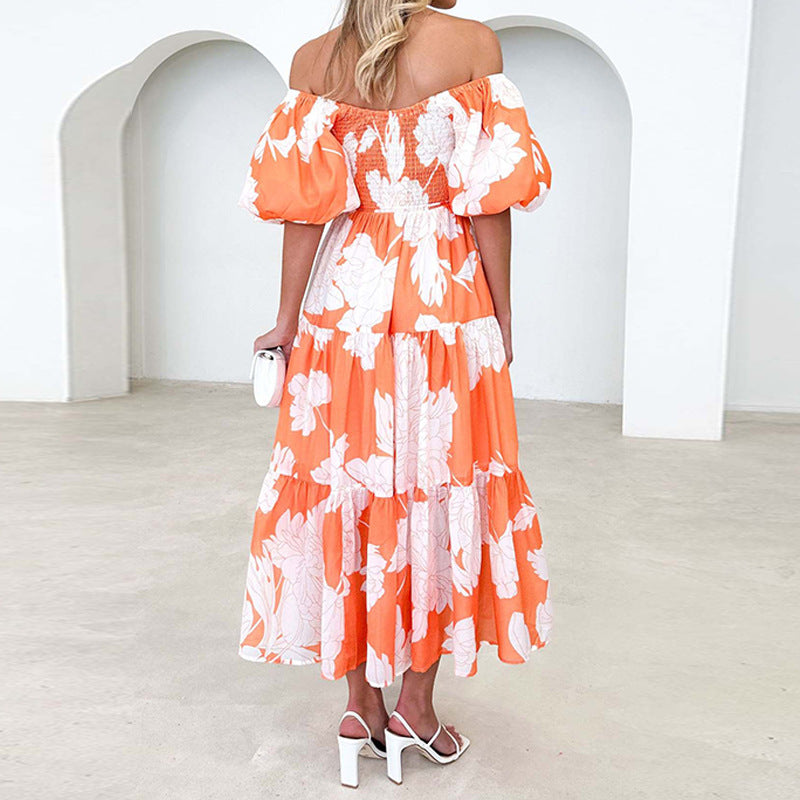 Robe Maxi pour femmes avec de volumineuses manches bouffantes et un design floral Chic & Stil