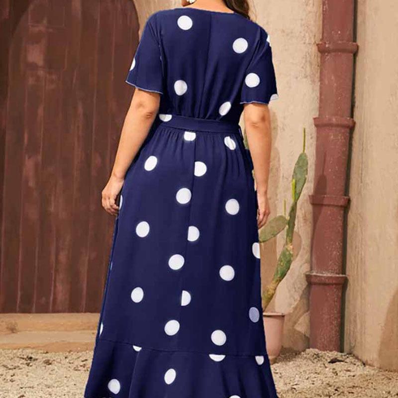 Maxi dress for women with a playful polka dot pattern and a fitted belt Lune London