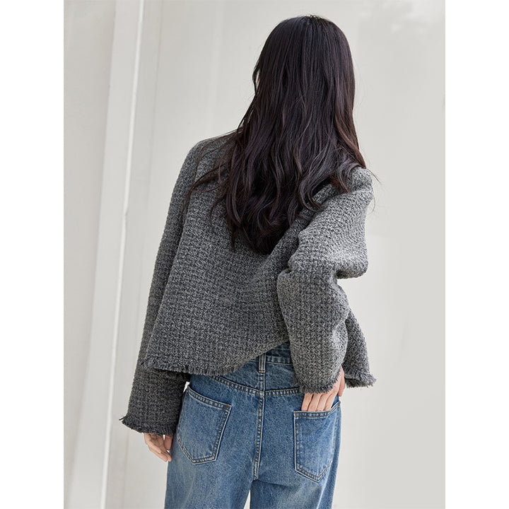 Trendy boucle blazer for women with an elegant cut and chic pockets