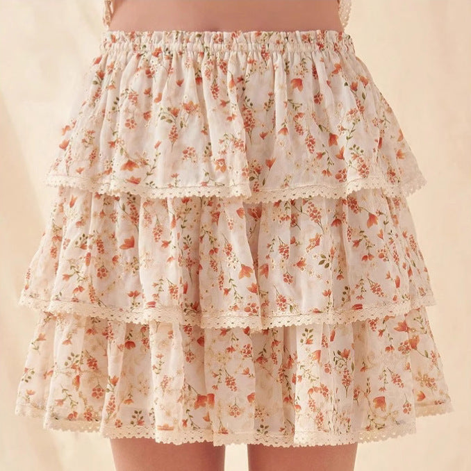 Flared mini skirt for women with floral ruffle details Lune London