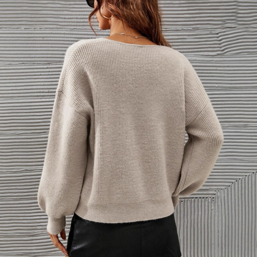 Pull femme à col en V avec une coupe décontractée et des manches ballon à la mode Chic & Stil